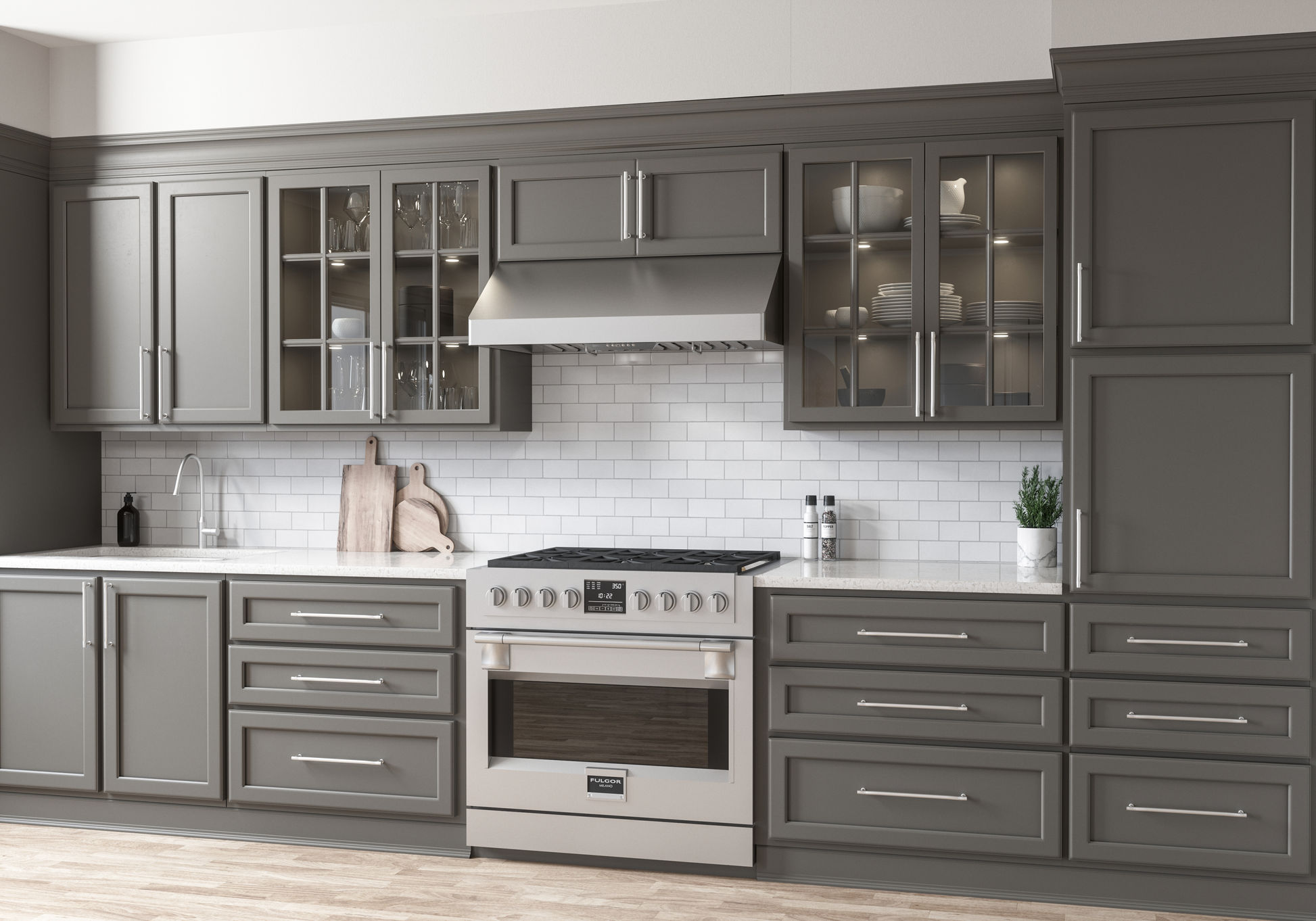 Sleek stainless steel under-cabinet range hood with LED lighting and pro baffle filters mounted above a gas cooktop in a modern kitchen, featured in Range Hoods, Kitchen & Kitchenware, All Products, and Appliances collections.