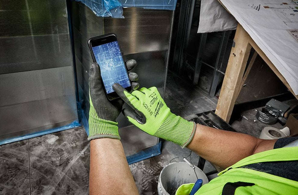Hi-vis cut-resistant gloves with polyurethane coating used on construction site for safety and work gloves in hardware collections