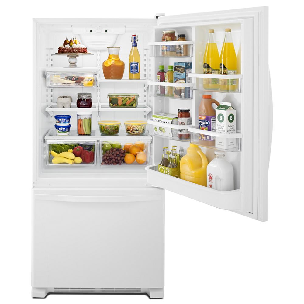 White bottom-freezer refrigerator open to show organized fresh food storage and spillproof glass shelves in kitchen appliances collection