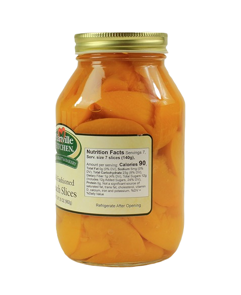 Glass jar of Hartville Kitchen peach slices with a gold lid in jams and jellies and food & beverage collections