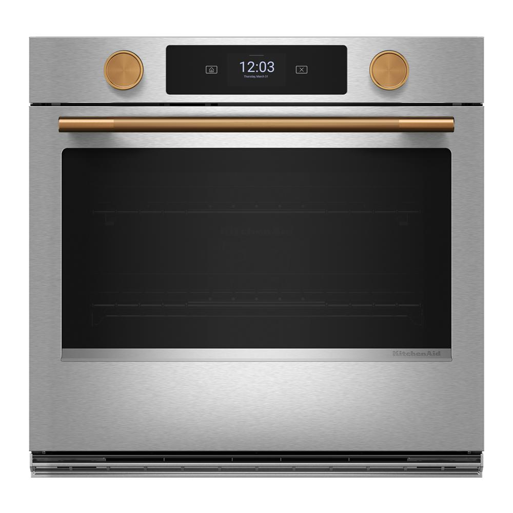 Stainless steel smart electric single wall oven with gold-tone knobs and handle in KitchenAid appliance collection