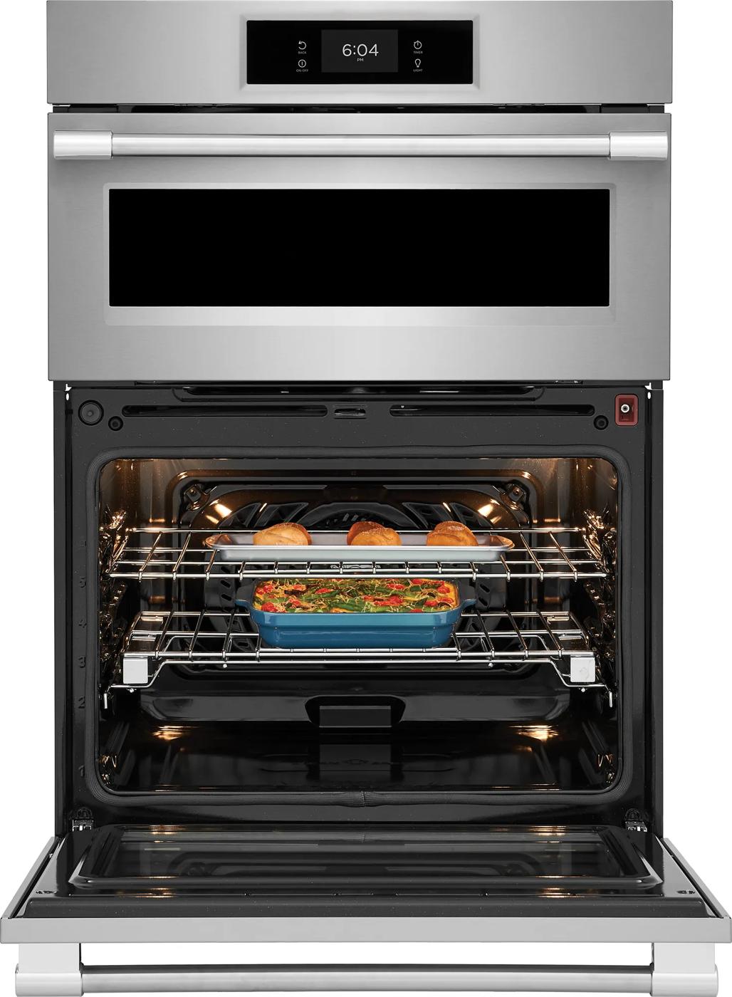 Open stainless steel electric wall oven with digital display baking casserole and rolls in Kitchen & Kitchenware collection