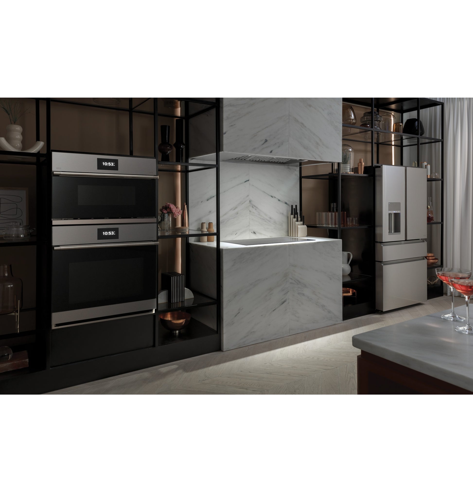 Sleek modern kitchen with stainless steel appliances, custom LED-lit insert, marble backsplash, and open shelving units