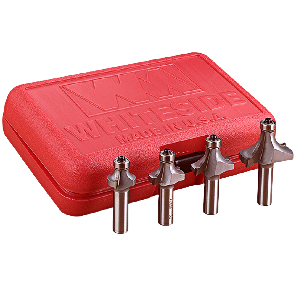 Set of four carbide roundover and beading router bits with 1/2 inch shanks in red tool accessories case