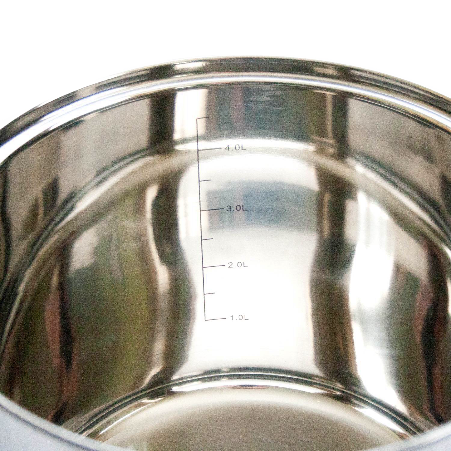 Close-up of a polished stainless steel interior with volume measurement markings in kitchenware and appliances collection
