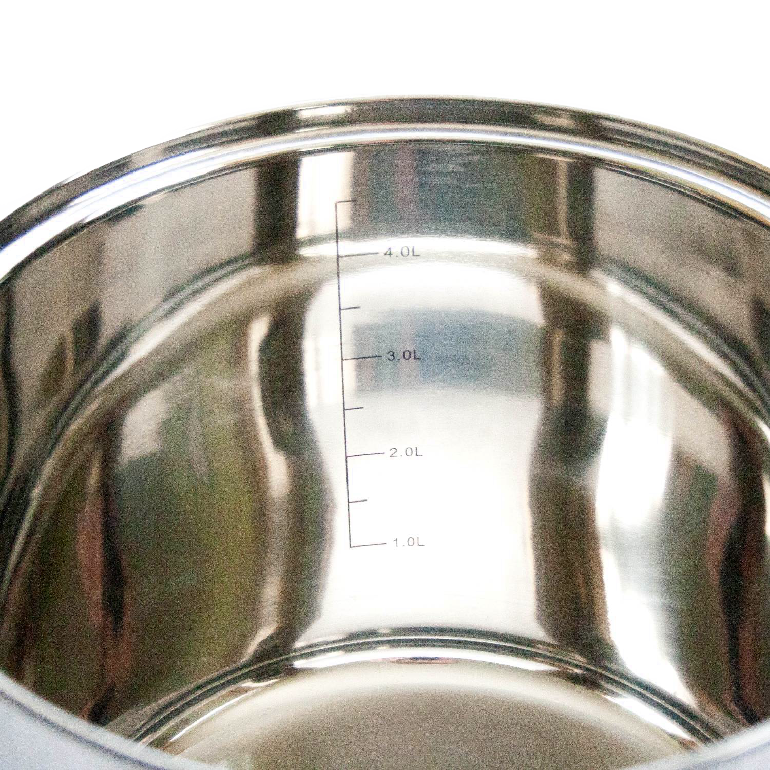 Close-up of a polished stainless steel interior with volume measurement markings in kitchenware and appliances collection