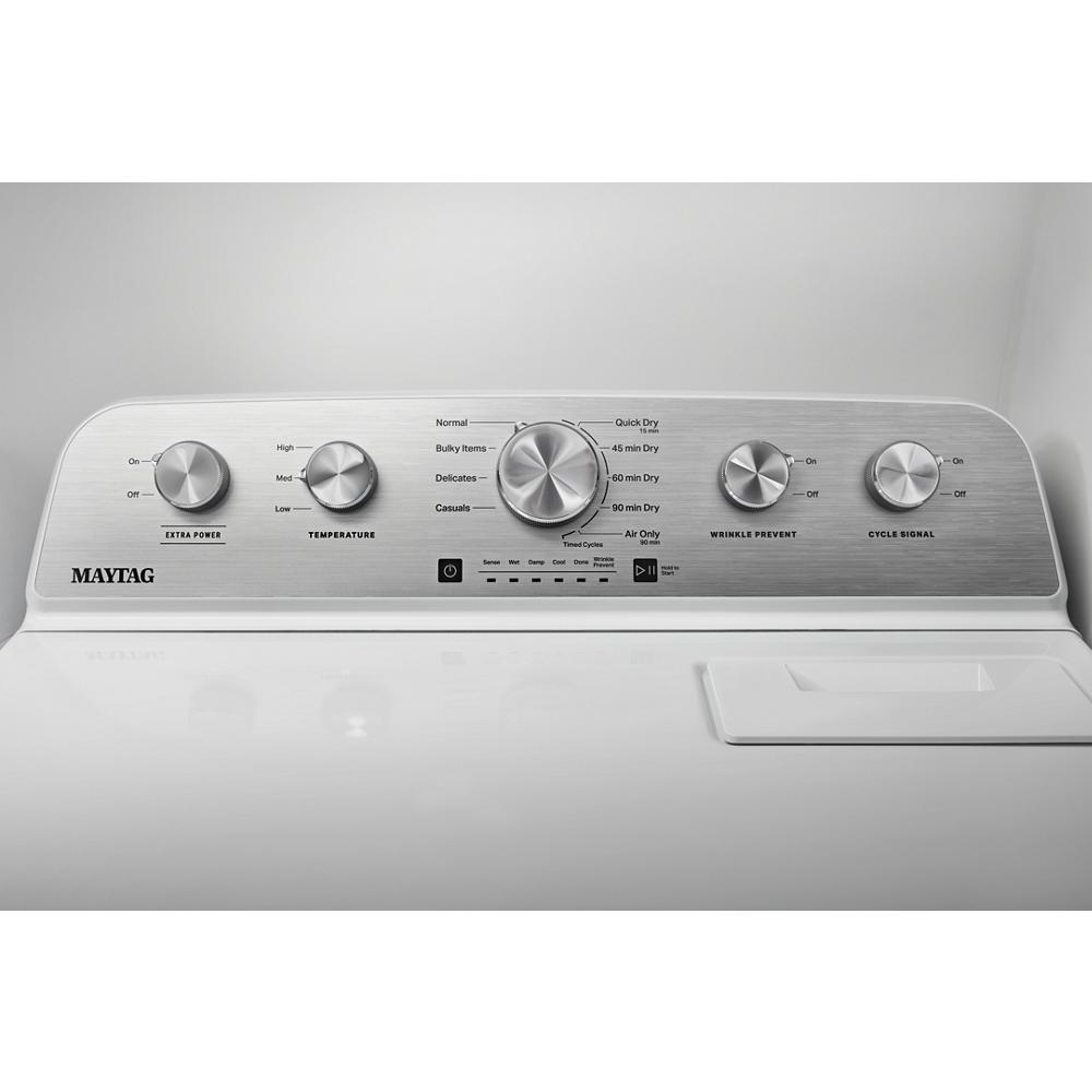 Close-up of Maytag dryer control panel with cycle selector, temperature, wrinkle prevent, and extra power knobs in gas dryers collection