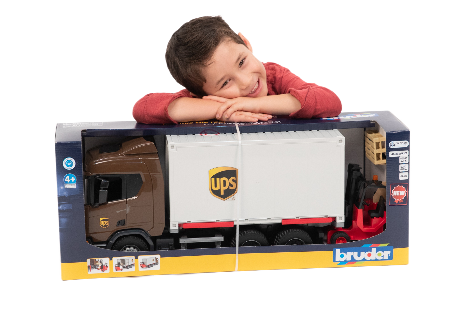 Child playing with a detailed Bruder UPS logistics toy truck and forklift from the Vehicles & Remote Controlled Toys collection
