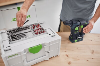Compact Festool tool storage box with transparent lid compartment organizing drill bits and accessories for workshop tools