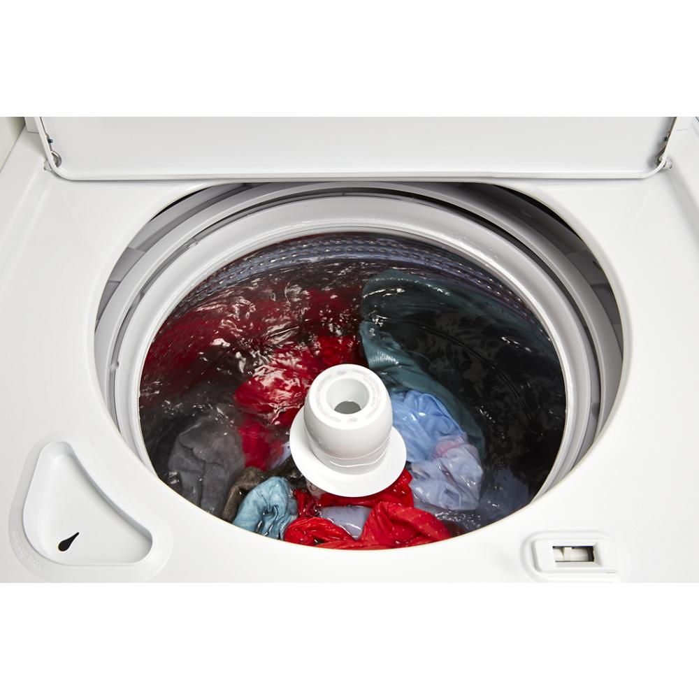 White top load washer with visible colorful laundry inside stainless steel wash basket from appliances collection