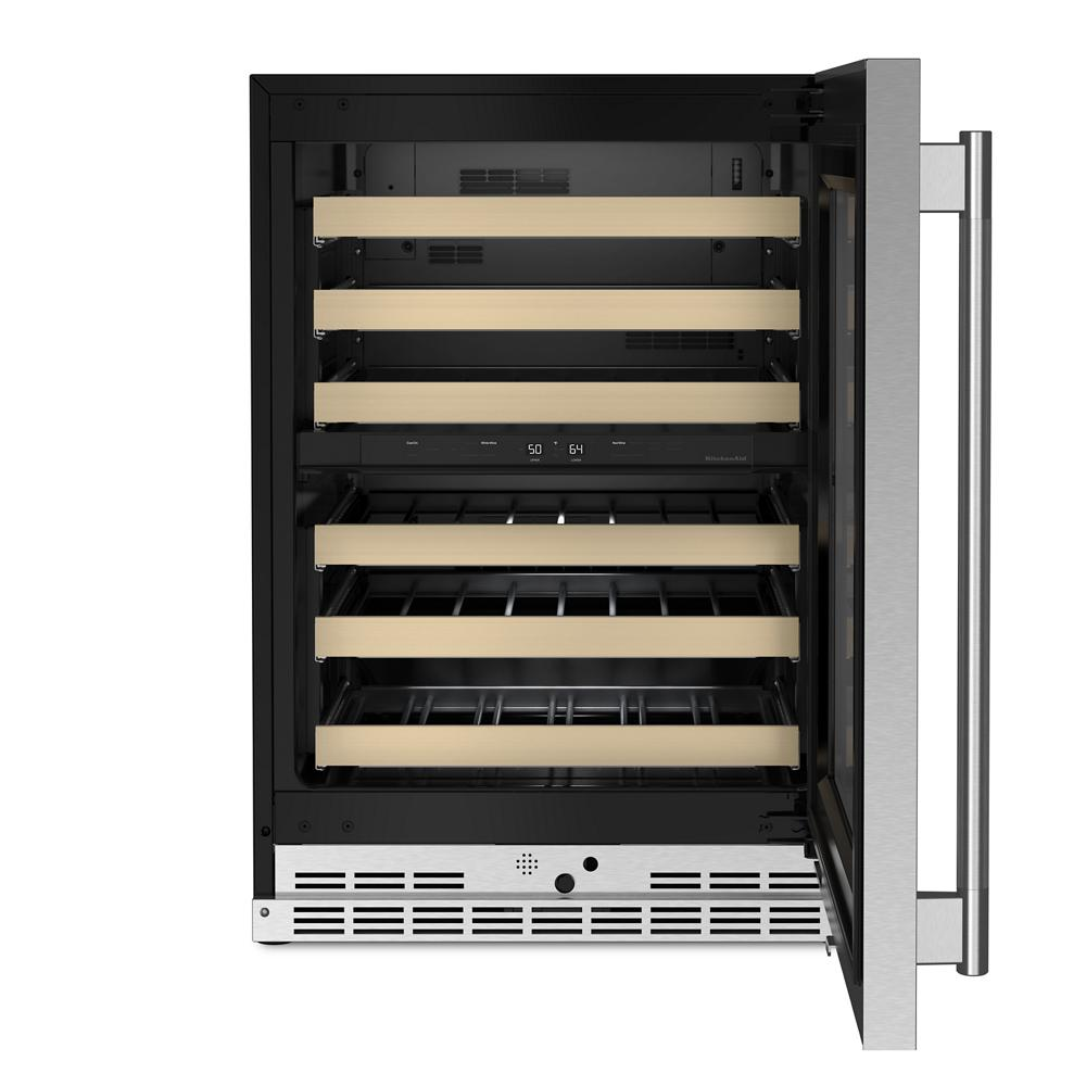 Undercounter beverage center with stainless steel handle, glass door, digital controls, and wood-front pull-out racks