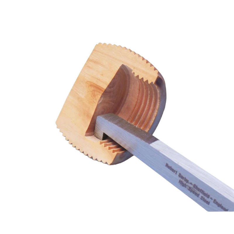 Relief cutting tool with rectangular blade carving a threaded groove in light wood, part of woodworking tools collection.