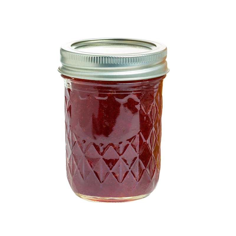 Glass jelly jar with quilted pattern filled with red jam and silver metal lid in kitchenware collection