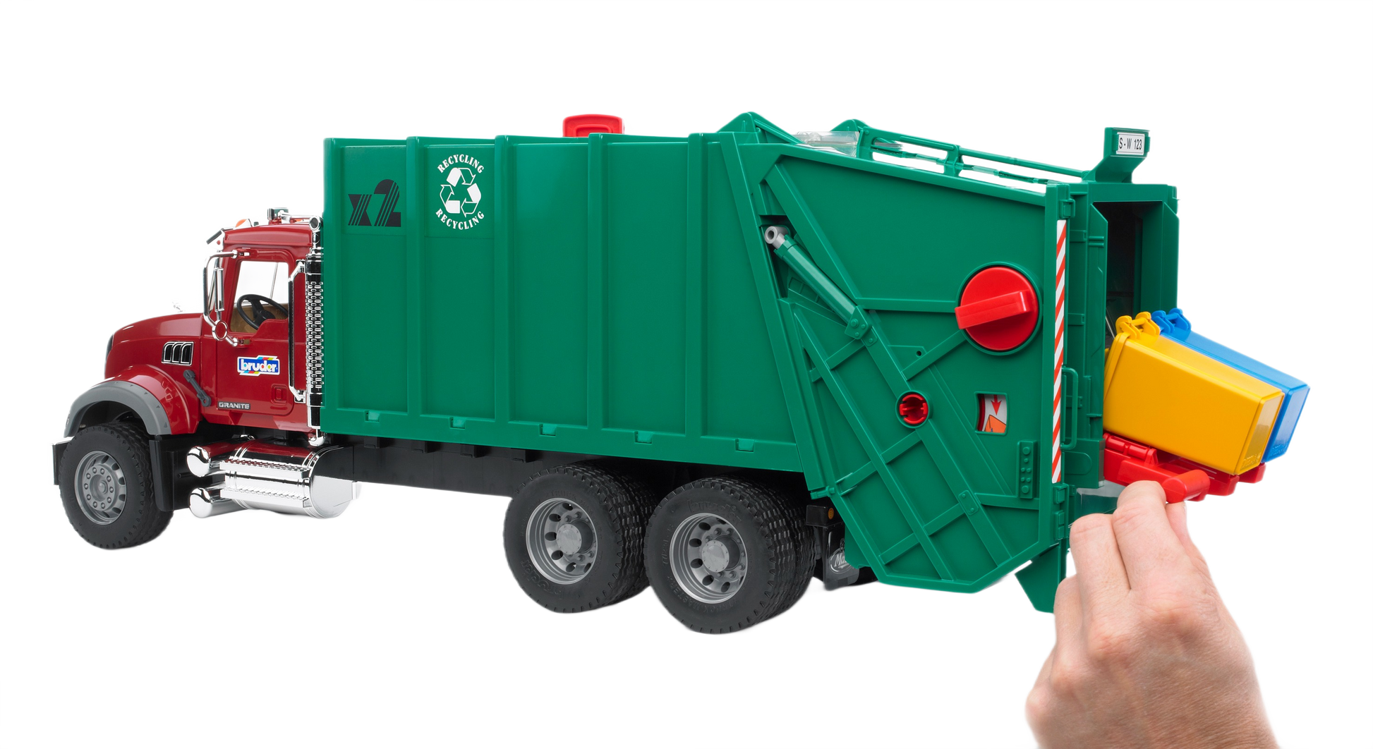 Green and red 1:16 scale Mack Granite garbage truck toy from Bruder Toys in Vehicles & Remote Controlled Toys collection
