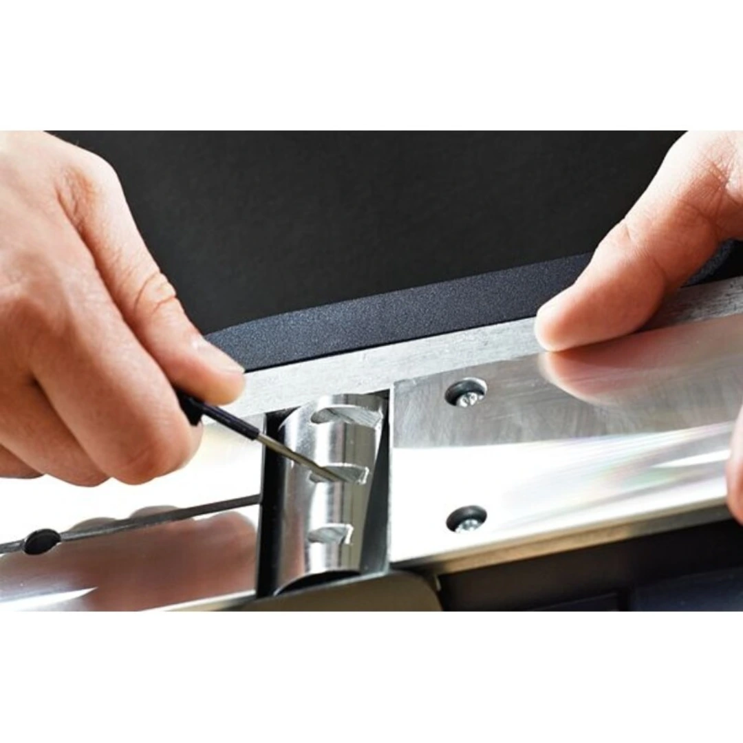 Hands installing a solid carbide replacement blade on a precision cutting tool for home improvement projects