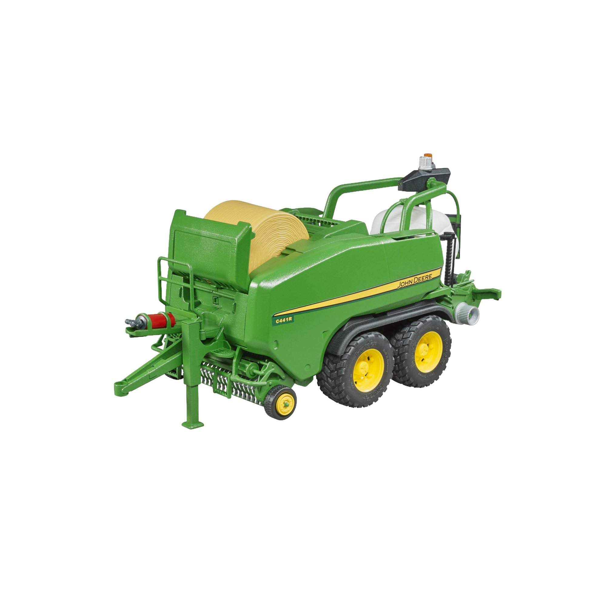 Green and yellow toy wrapping chamber baler with detailed round bale from Bruder Toys in Vehicles & Remote Controlled Toys collection