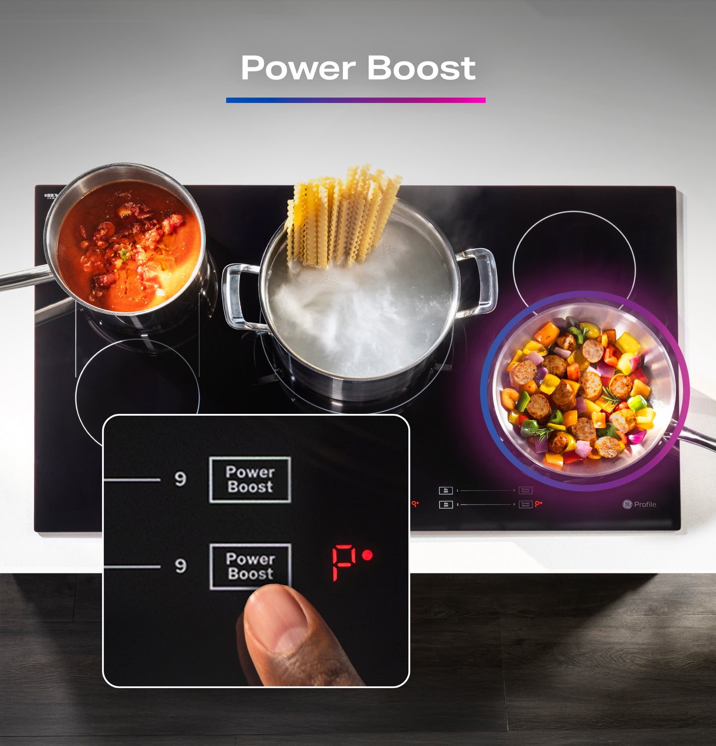 Finger activating Power Boost on black induction cooktop with three pots cooking pasta, sauce, and vegetables