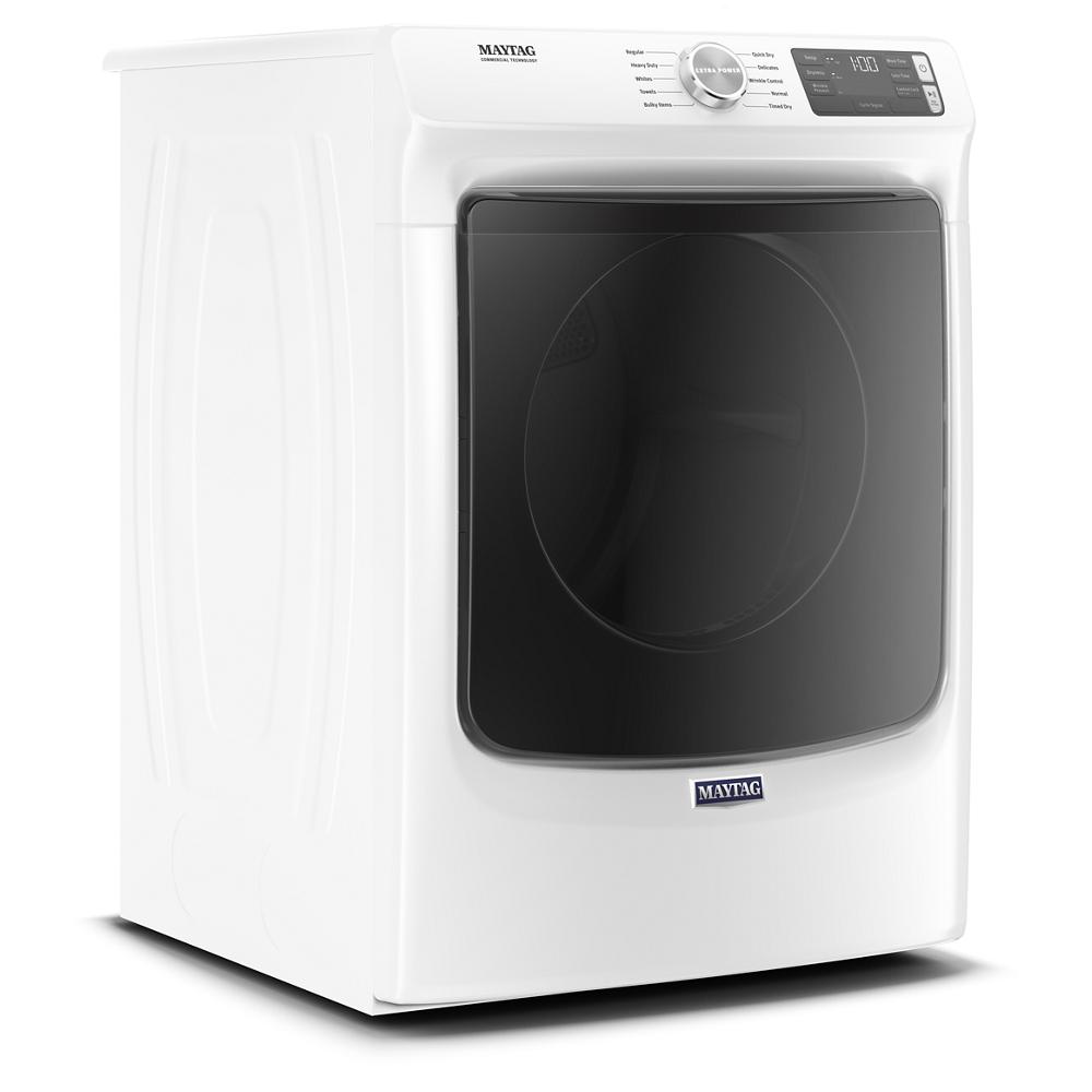 White front load electric dryer with black tinted door, digital controls, and metallic dial from home appliance collection