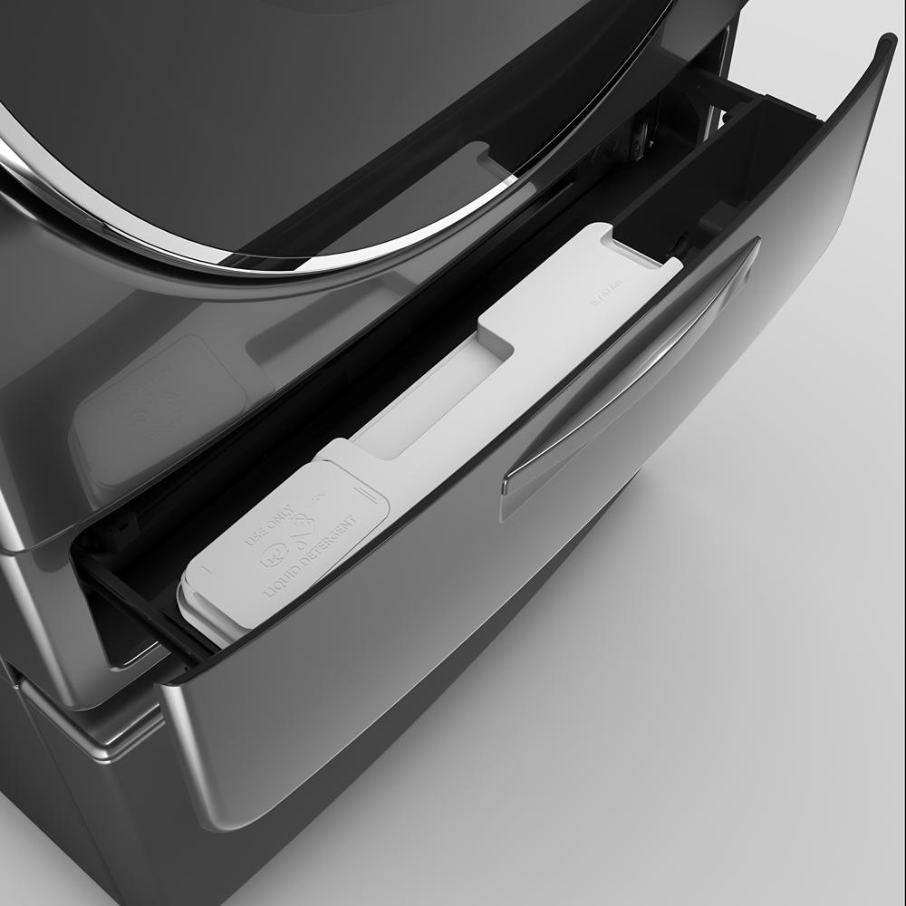 Open dispenser drawer on dark gray front load washer showing Load & Go™ XL detergent reservoir in washers collection