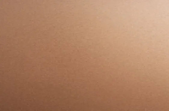 Close-up view of a smooth bronze-toned metal surface with a subtle matte finish, suitable for home improvement and lighting applications.