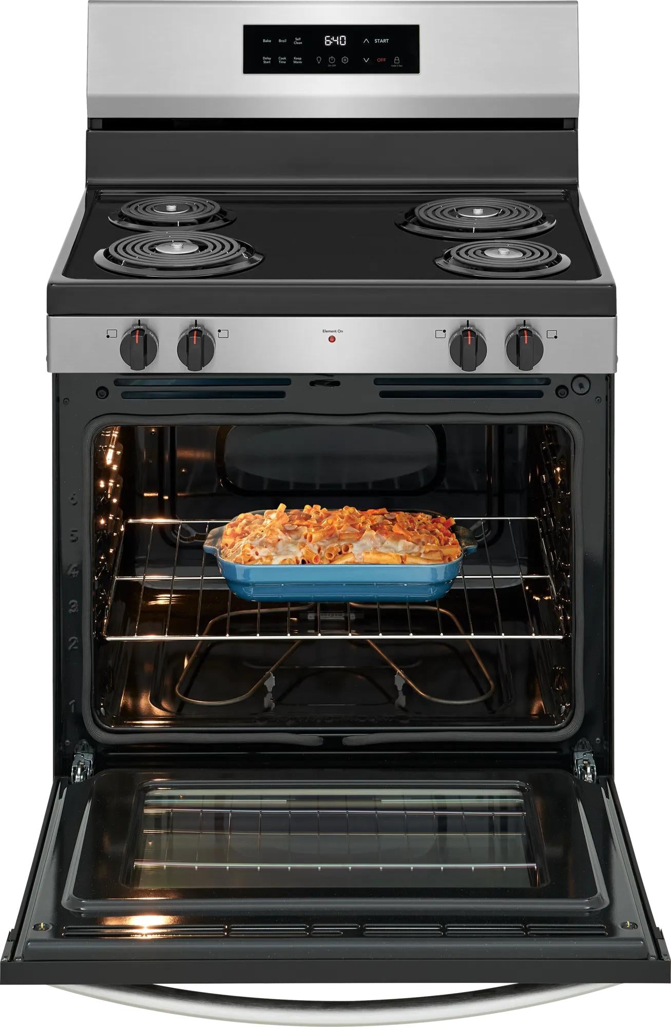 freestanding electric range with coil burners and illuminated oven cooking casserole in kitchen appliances collection