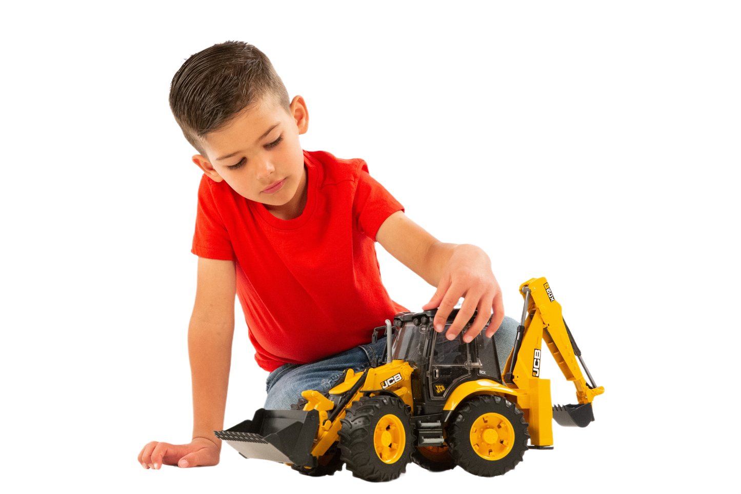 Child in red shirt playing with yellow Bruder Toys JCB 5CX Eco backhoe loader in toy collections under $100