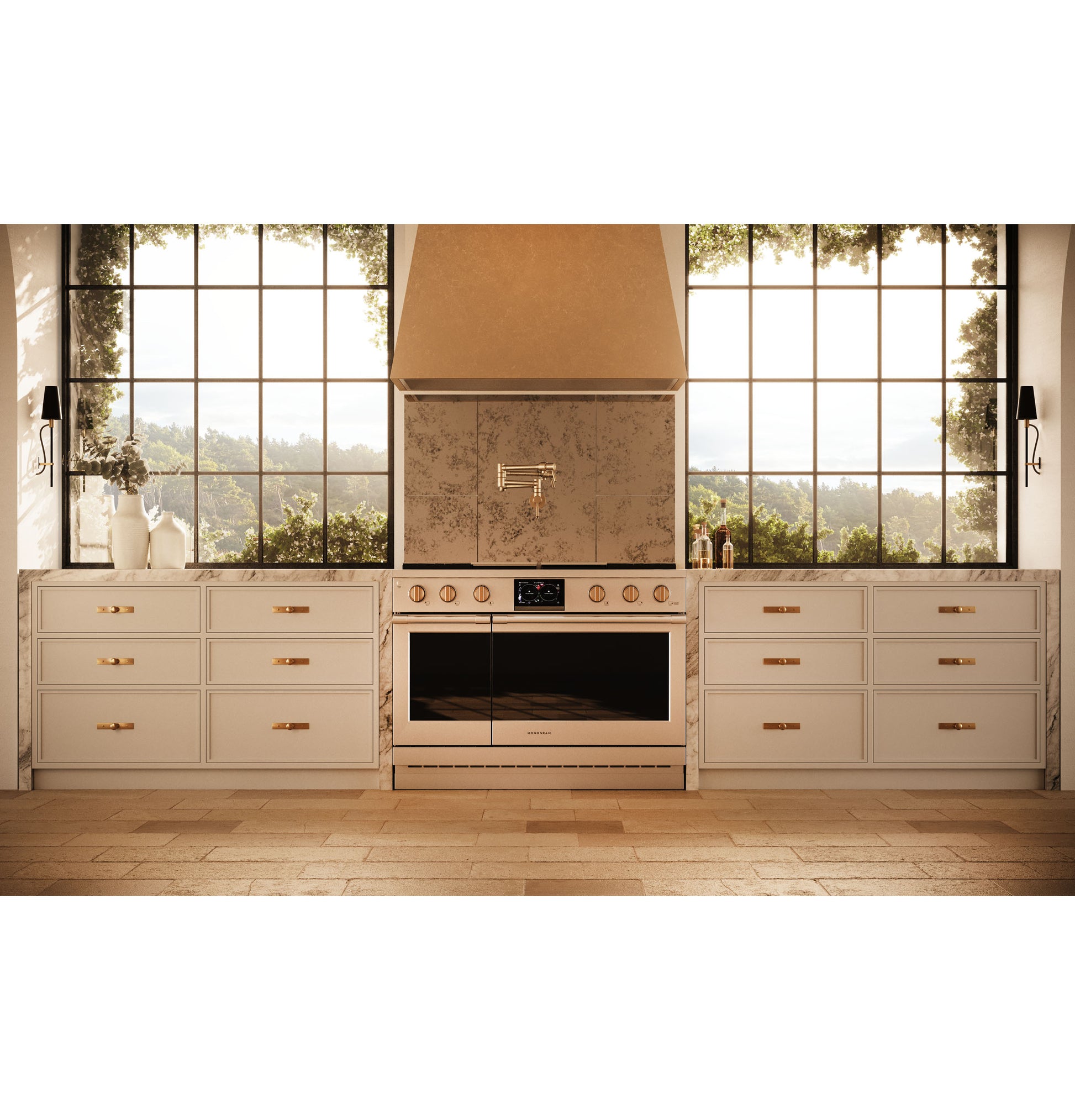 Bright kitchen with brass range hood, white cabinetry, large windows, and a modern stove for home improvement.