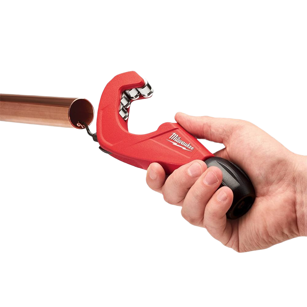 Red constant swing copper pipe cutter with four rollers and black knob held for plumbing and home improvement use