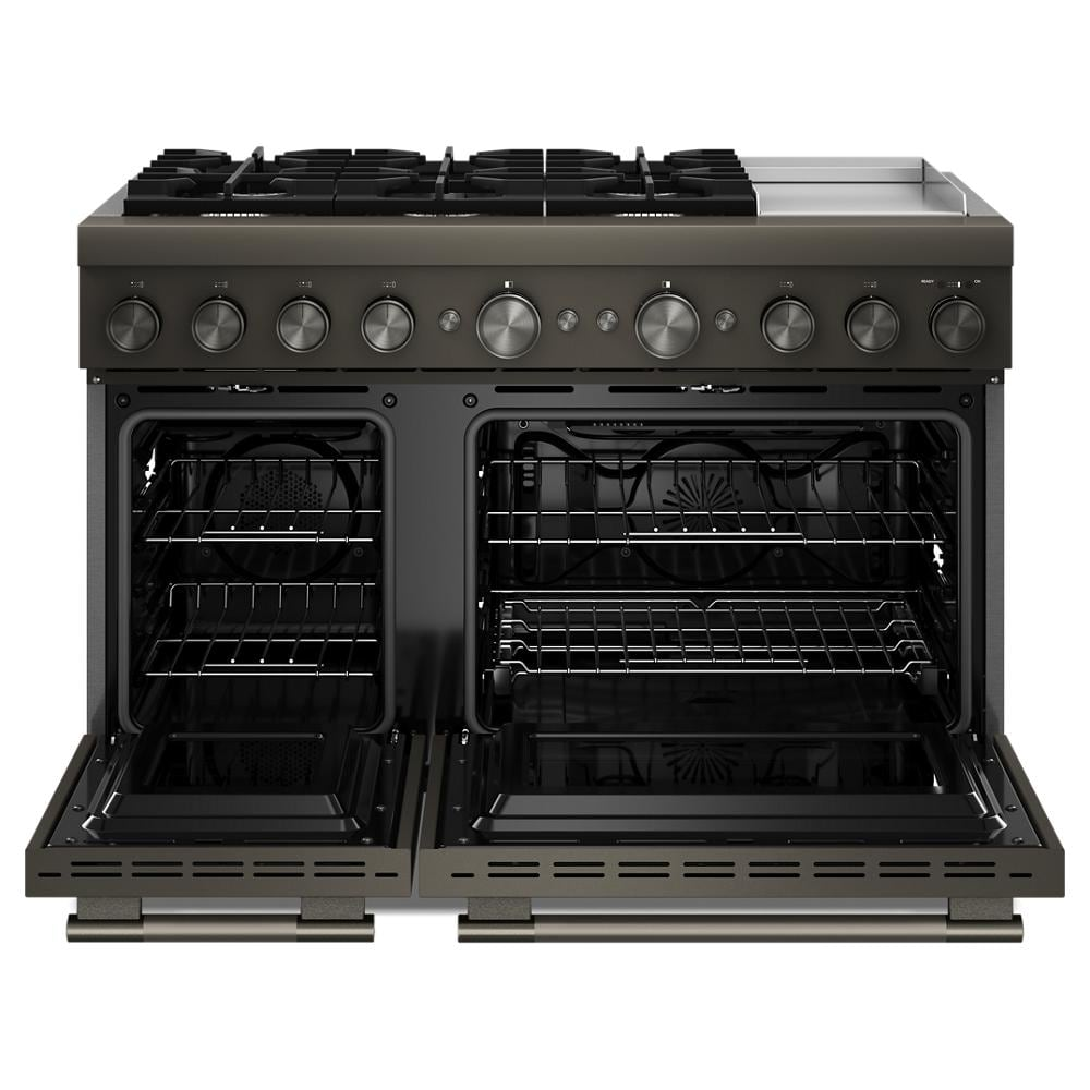 Front view of open dual oven with six burner gas cooktop and electric griddle in KitchenAid range collection