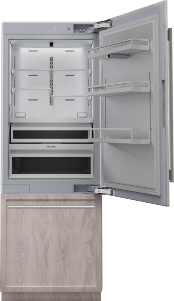 Open built-in bottom freezer refrigerator with panel-ready wood front and multiple adjustable shelves from Freezers collection