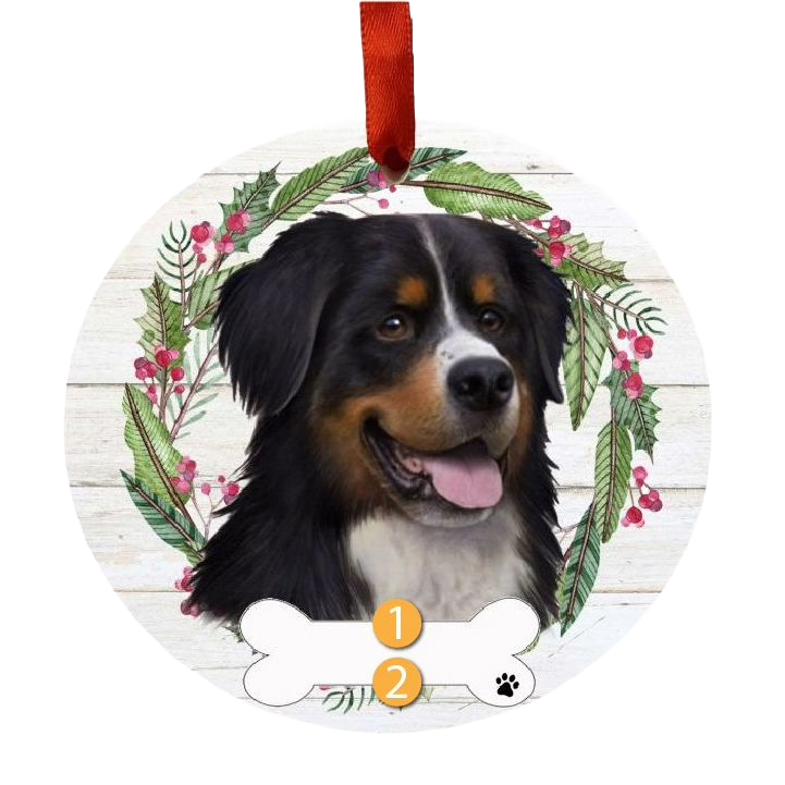 Round Christmas ornament featuring a Bernese Mountain Dog face with a festive wreath and red hanging ribbon