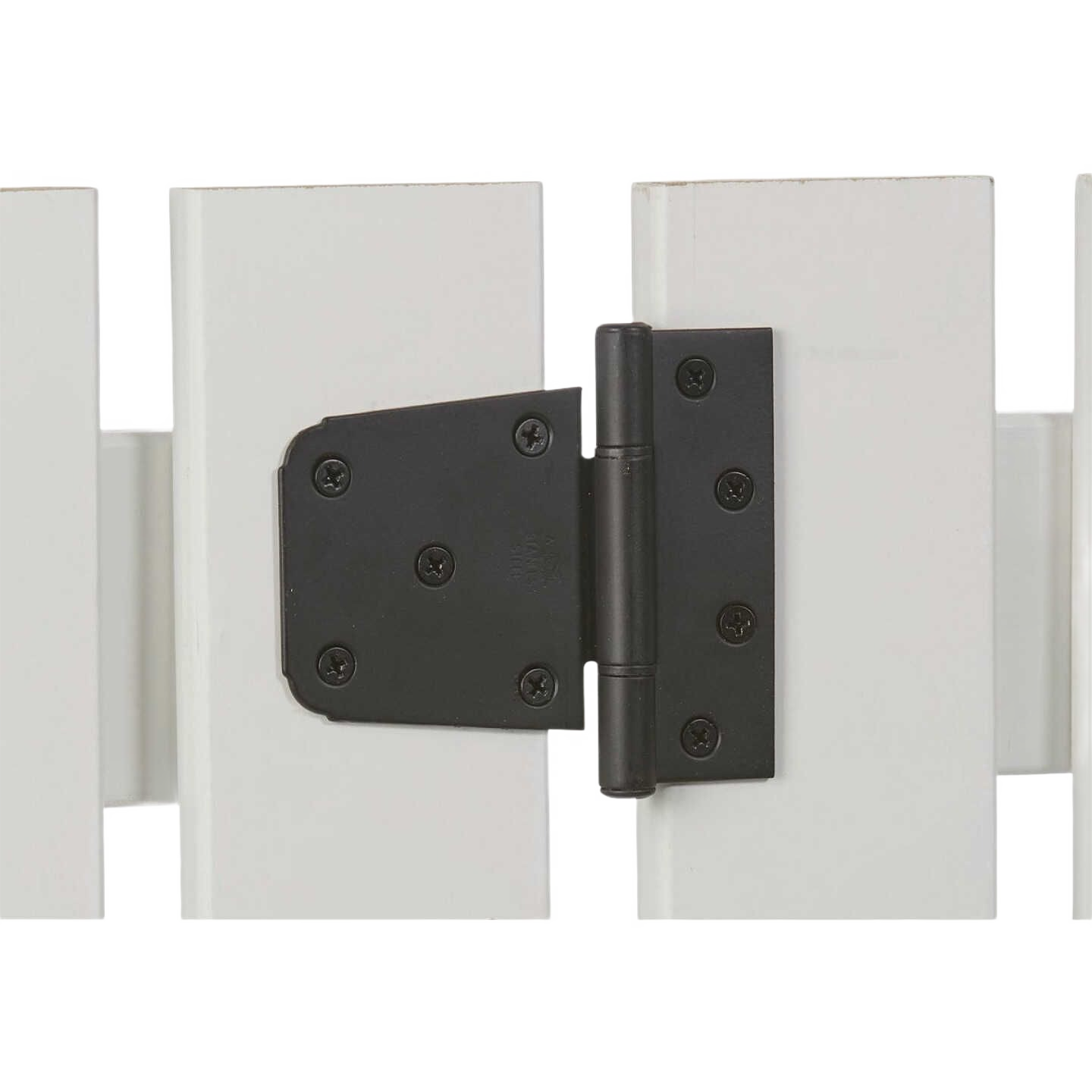 Matte black steel heavy-duty gate hinge mounted on white wooden fence posts for home improvement and gate hardware use