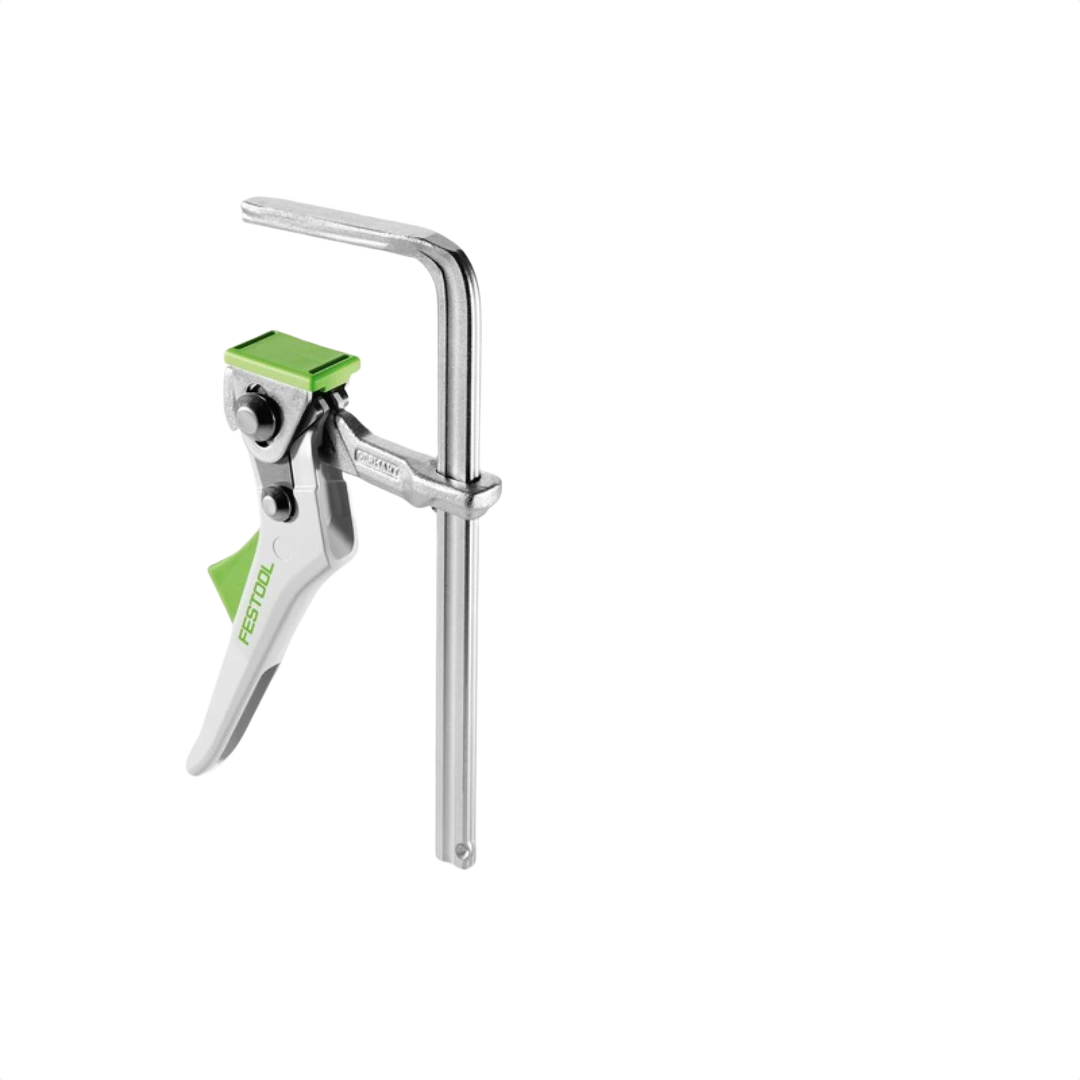 Compact quick clamp with ergonomic handle and green accents for secure holding in woodworking tool accessories at Hartville Hardware