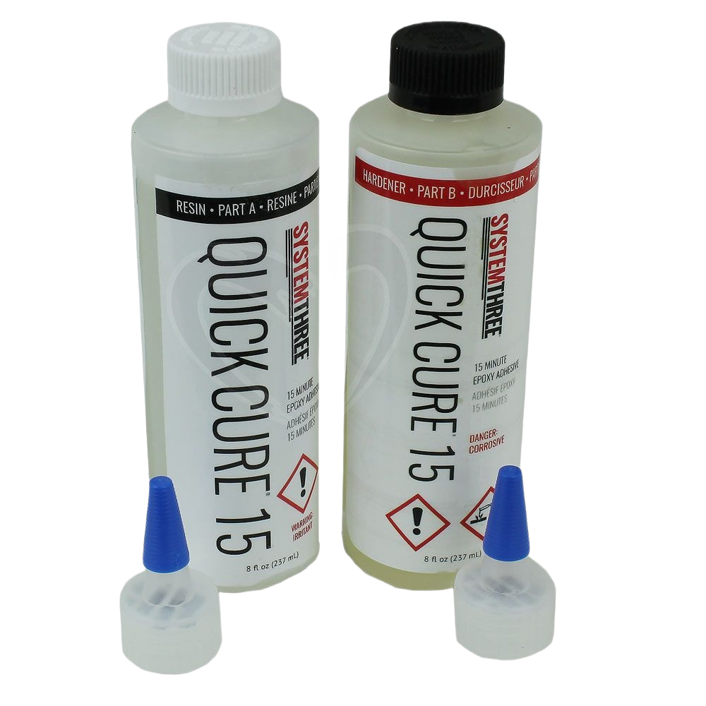 Two clear 8 oz bottles of System Three Quick Cure-15 epoxy resin and hardener with blue nozzle caps for home improvement.
