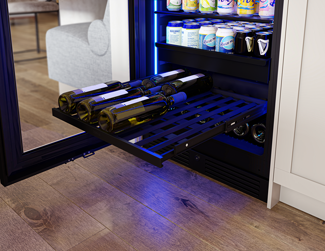 Open panel-ready beverage cooler with a pull-out rack holding wine bottles and illuminated interior in kitchen setting