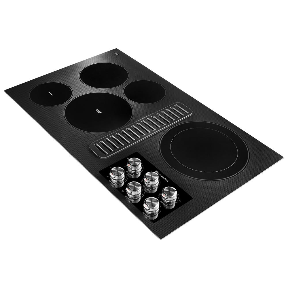 36-inch black electric downdraft cooktop with five heating elements and stainless steel control knobs in kitchenware collection