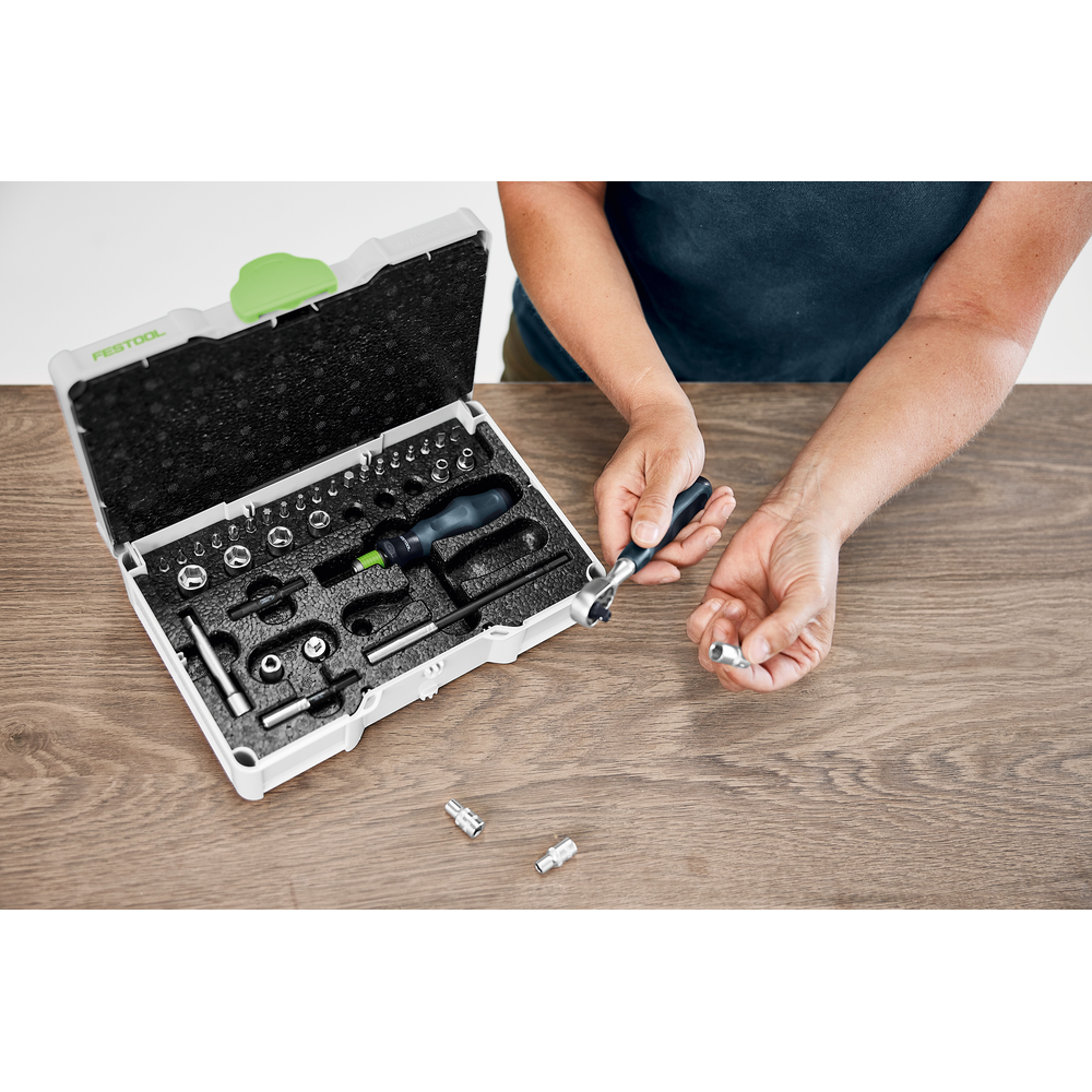 Ratchet set with multiple socket heads and ergonomic handle in a protective white case for home improvement tasks