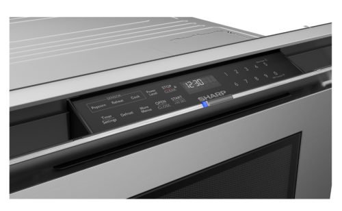Close-up of stainless steel built-in microwave drawer control panel with digital display and touch buttons in appliances collection