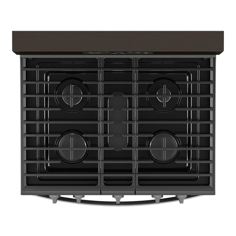 Top view of a black 30-inch gas range featuring four burners and continuous cast iron grates from kitchen appliances collection