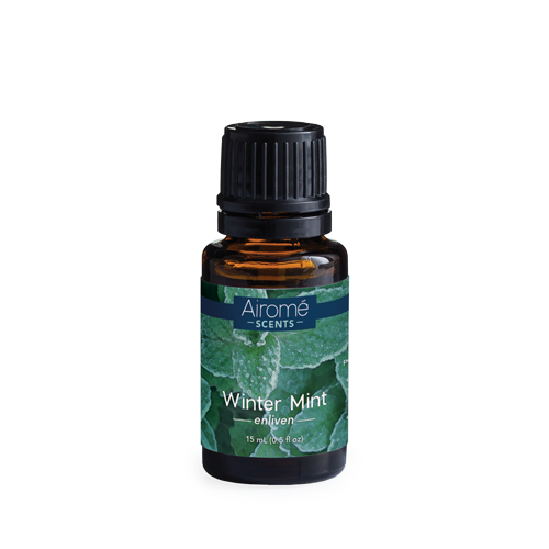 Amber glass bottle of Airome Winter Mint essential oil with green leaf label and black plastic cap