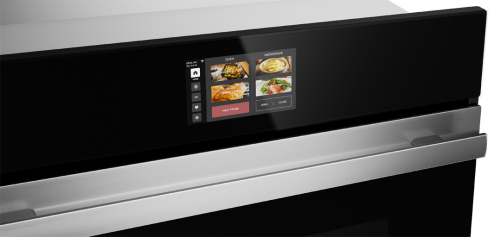 Close-up of digital touchscreen control panel on stainless steel smart wall oven and microwave drawer combo