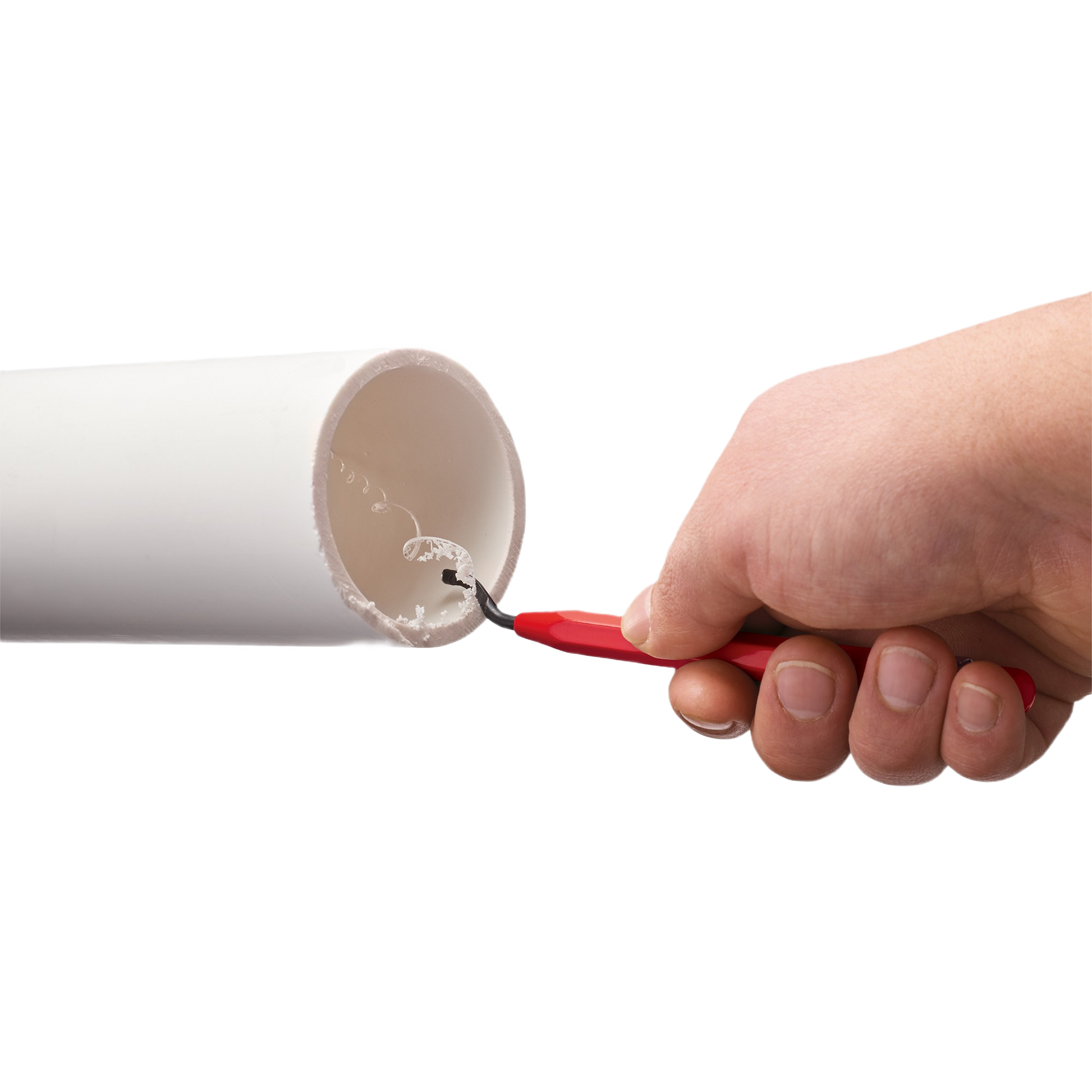 Hand using red Milwaukee reaming pen to smooth the inside edge of a white PVC pipe for home improvement tasks