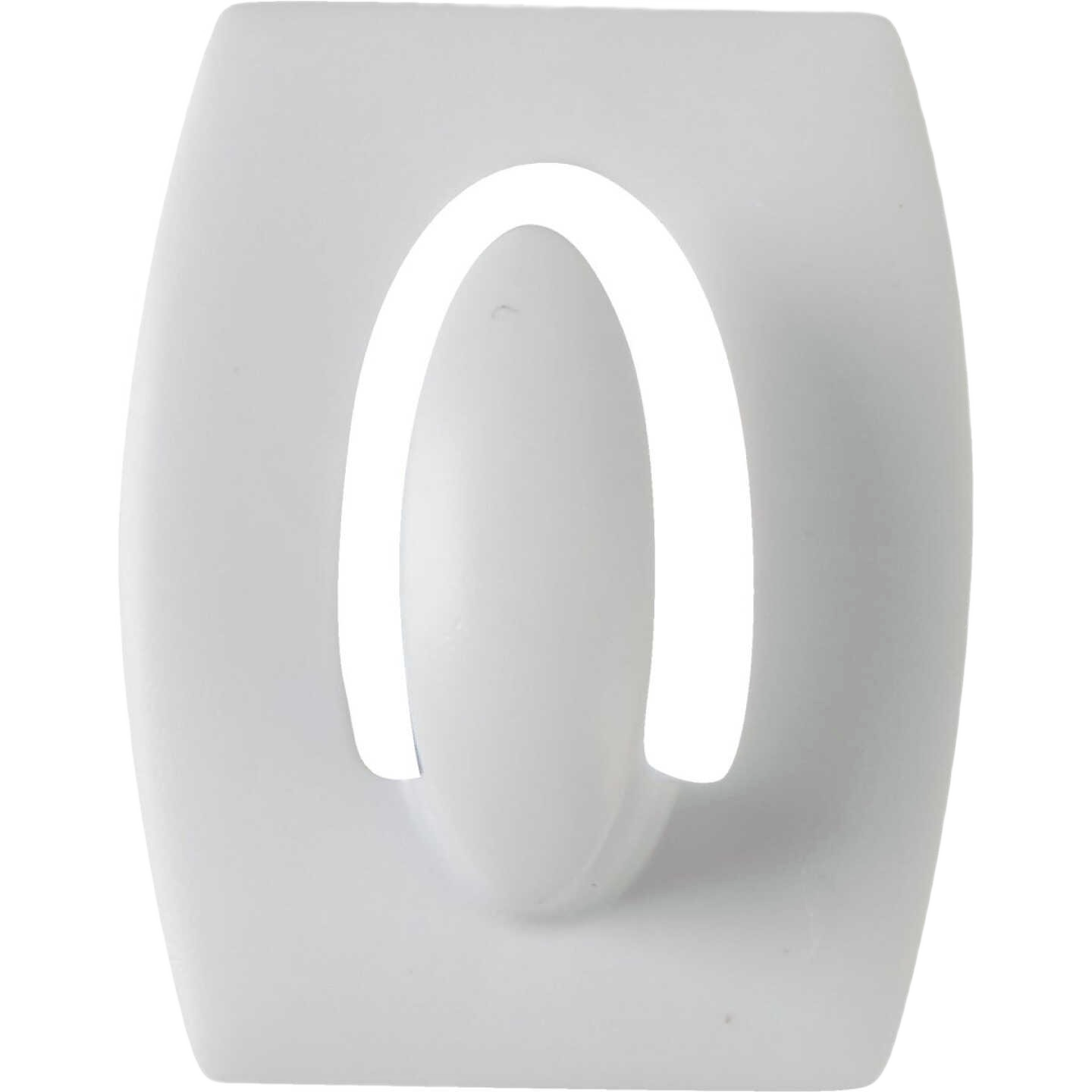 Single white adhesive mini hook with a curved design for easy hanging in home improvement and tools projects