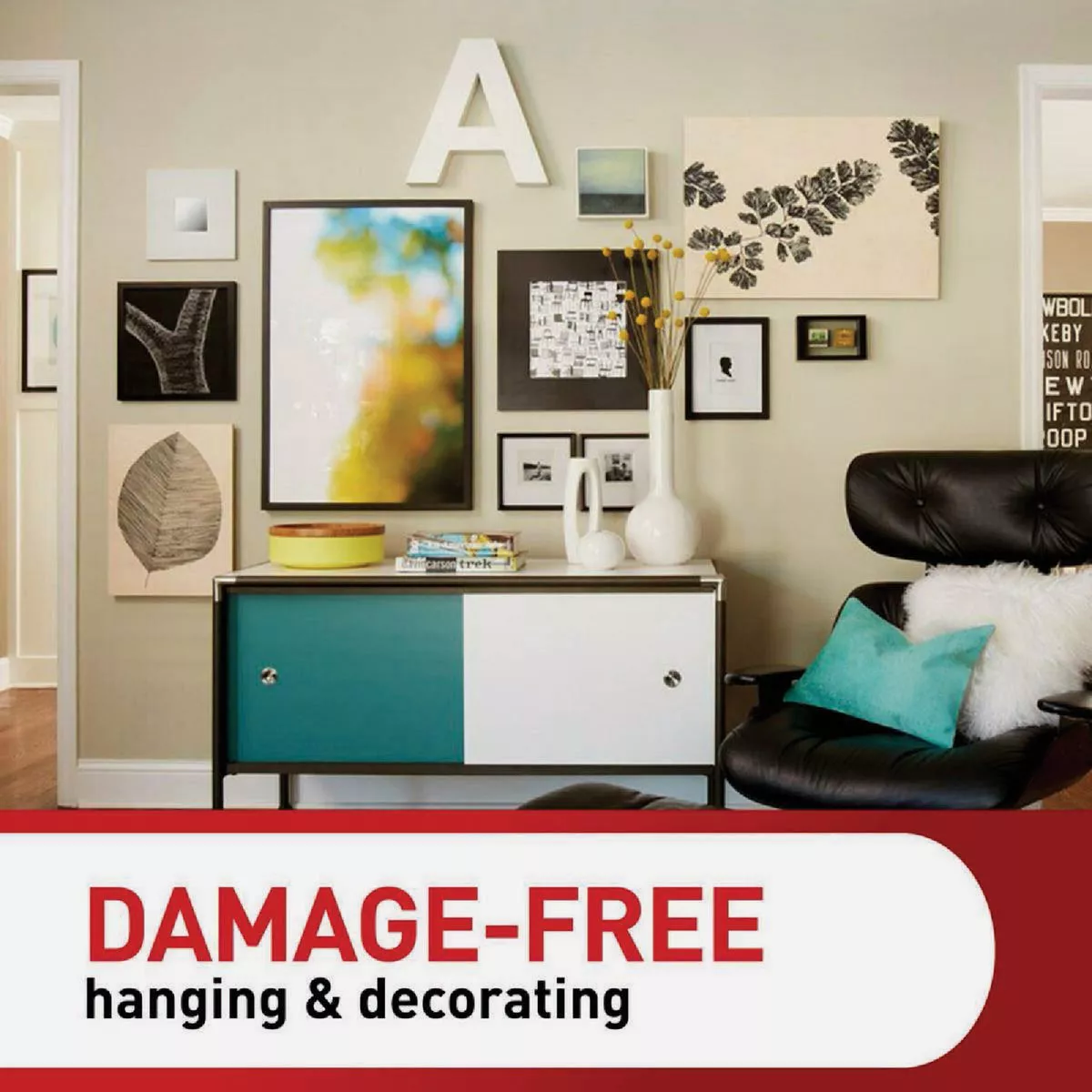 Living room wall with framed art and decor showcasing damage-free hanging for home improvement and hardware tools.