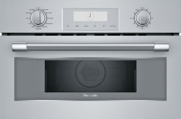 Front view of a stainless steel speed oven with control knobs and digital timer in Microwaves and Appliances collections