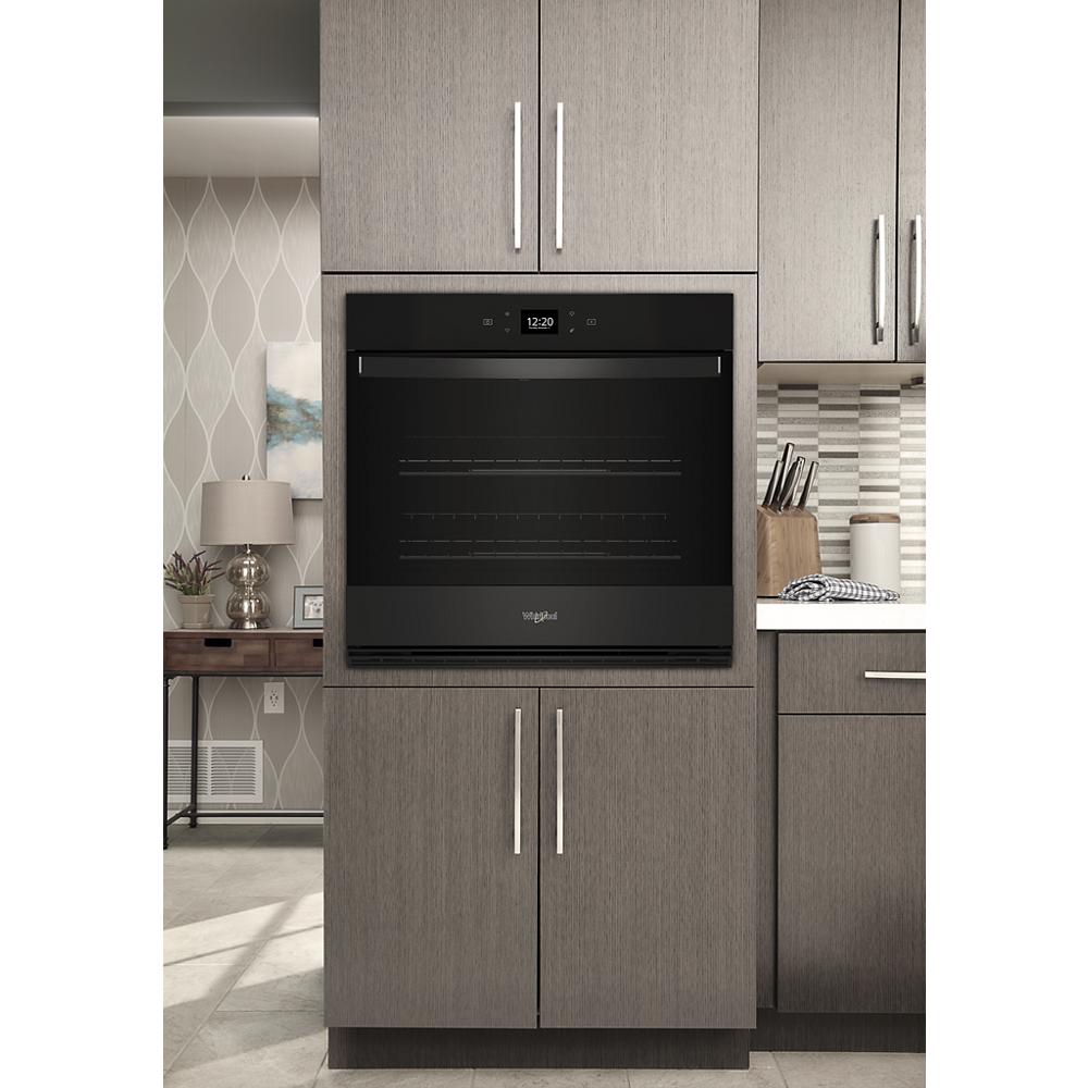 Built-in black Whirlpool wall oven with digital display and air fry feature in Kitchen & Kitchenware and Appliances collections