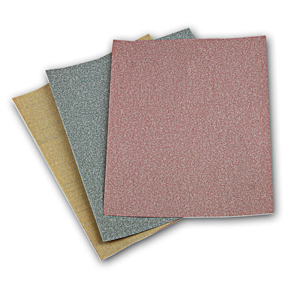 Three assorted grit sandpaper sheets stacked for sanding and surface preparation in home improvement tasks