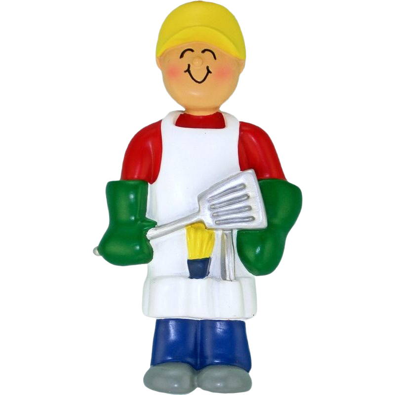 Smiling grilling figure ornament wearing yellow cap, red shirt, white apron, and green mitts holding a spatula Christmas decoration