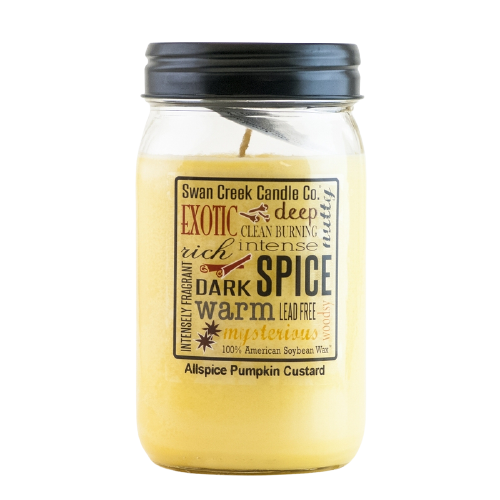 Yellow soy wax jar candle labeled with spicy warm fragrance notes and black metal lid for home ambiance and decor