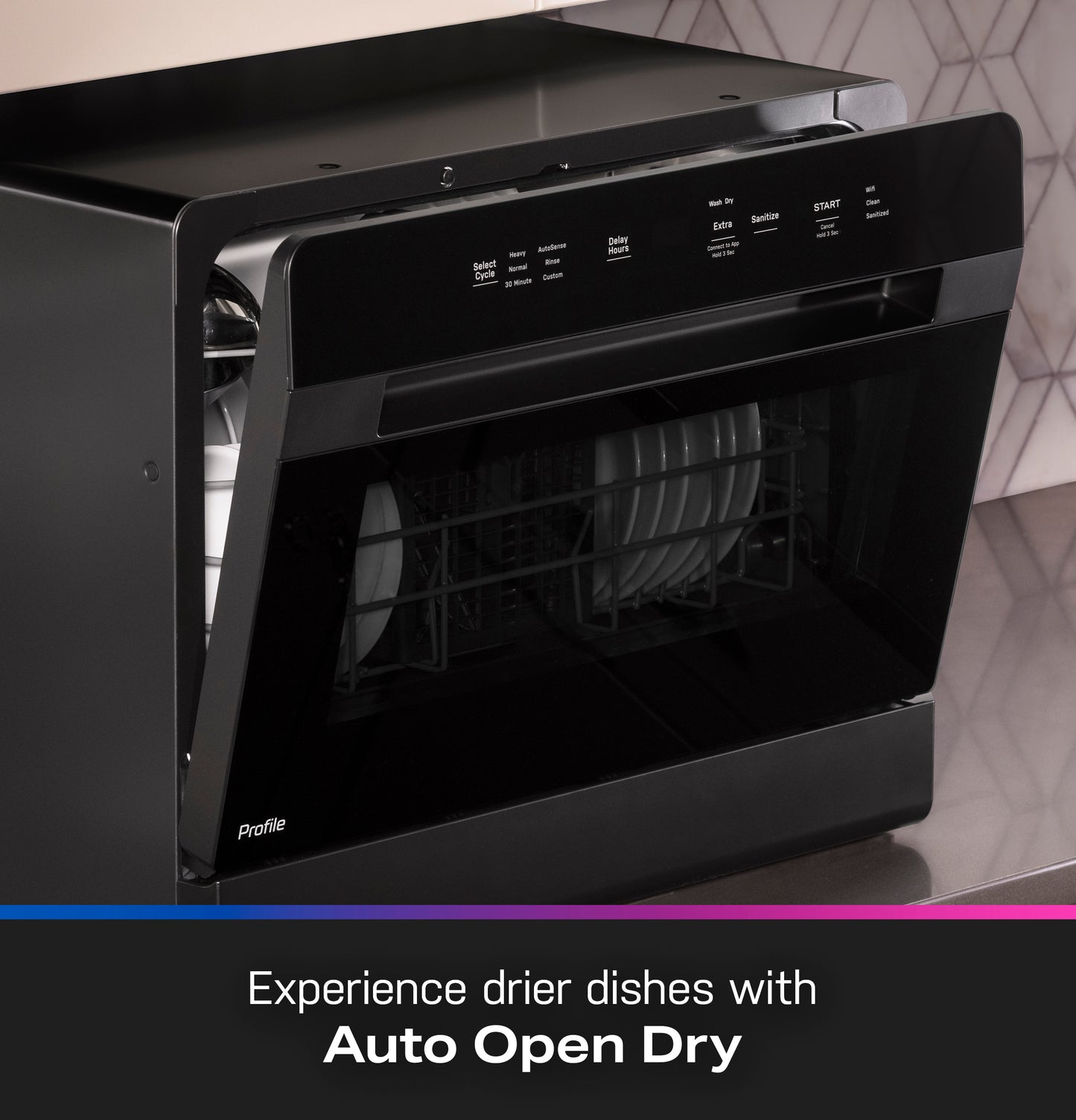 Black GE Profile smart compact dishwasher with partially open door showing loaded dishes on kitchen countertop surface